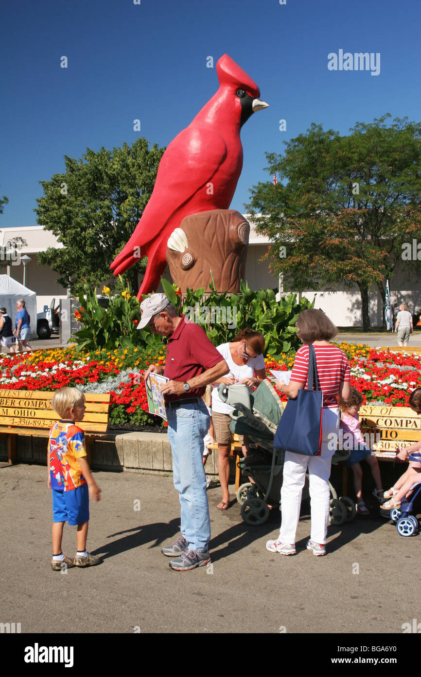 Cardinal Statue at Ohio State Fair. Columbus, Ohio, USA. State bird. People checking maps to start the day. Stock Photo