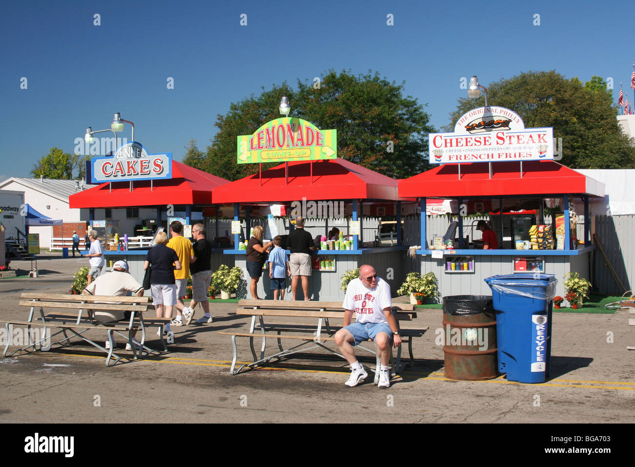 Food Vendor Stands at Ohio State Fair. Columbus, Ohio, USA. Trash and Recycle bins visible at right. Stock Photo