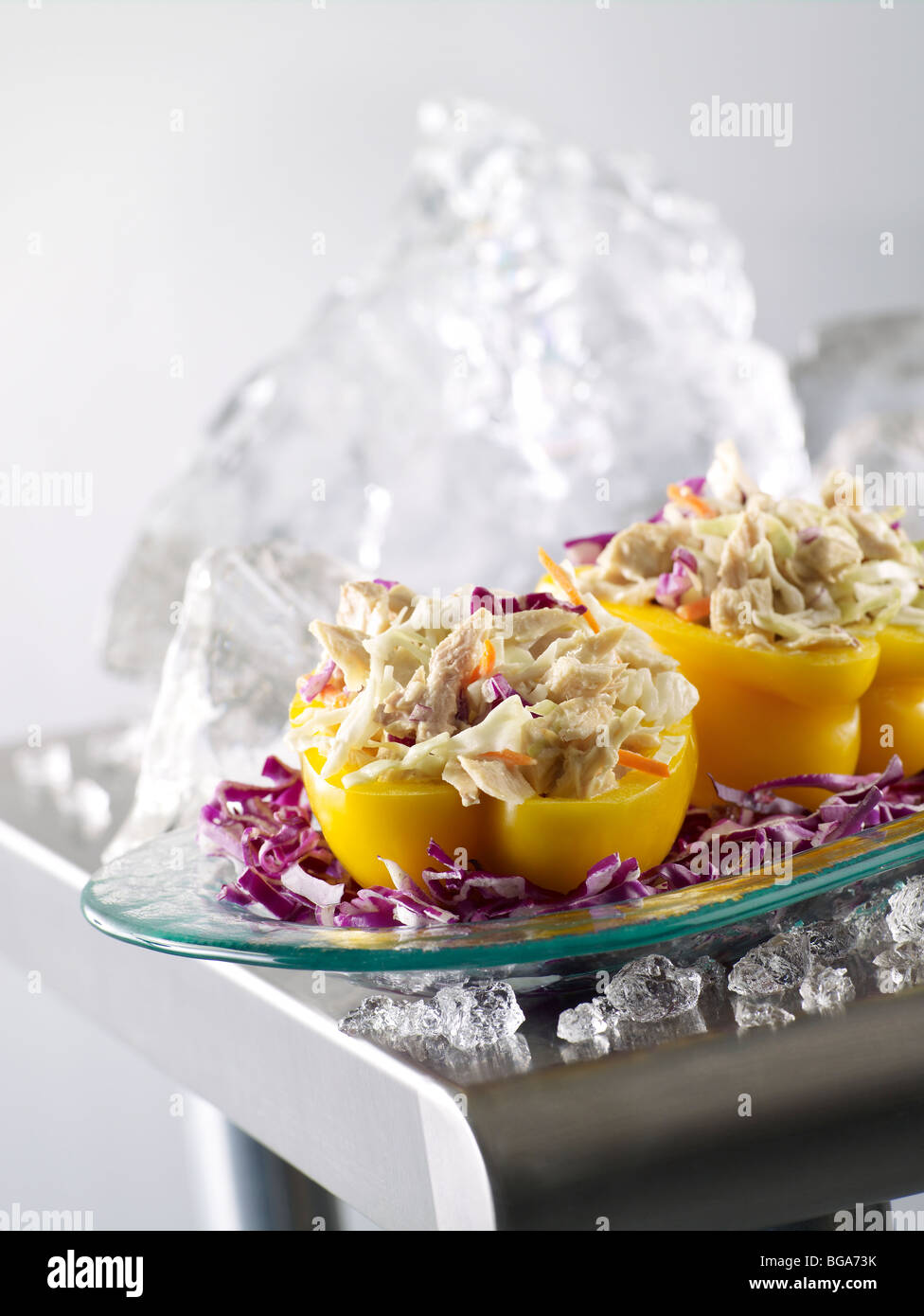 Tuna salad stuffed yellow peppers Stock Photo