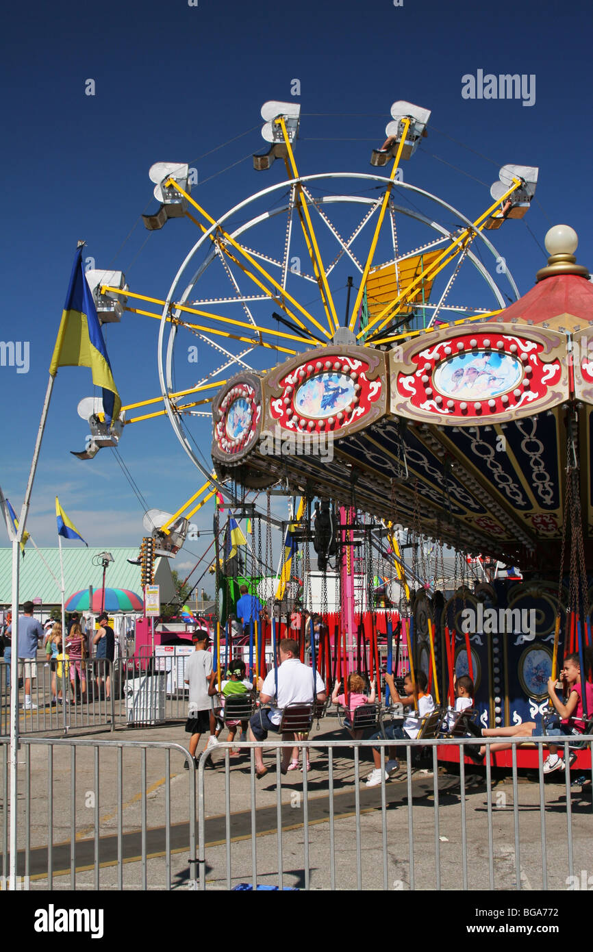 Ferris Wheel and Carousel Carnival Rides. Ohio State Fair. Columbus, Ohio. Stock Photo