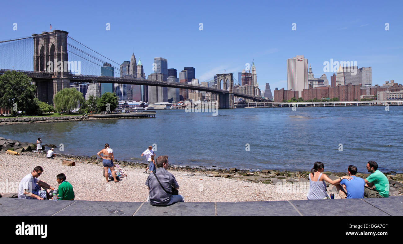 Brooklyn Bridge and Skyline of Manhattan seen from Fulton Ferry in Brooklyn, New York, United States Stock Photo