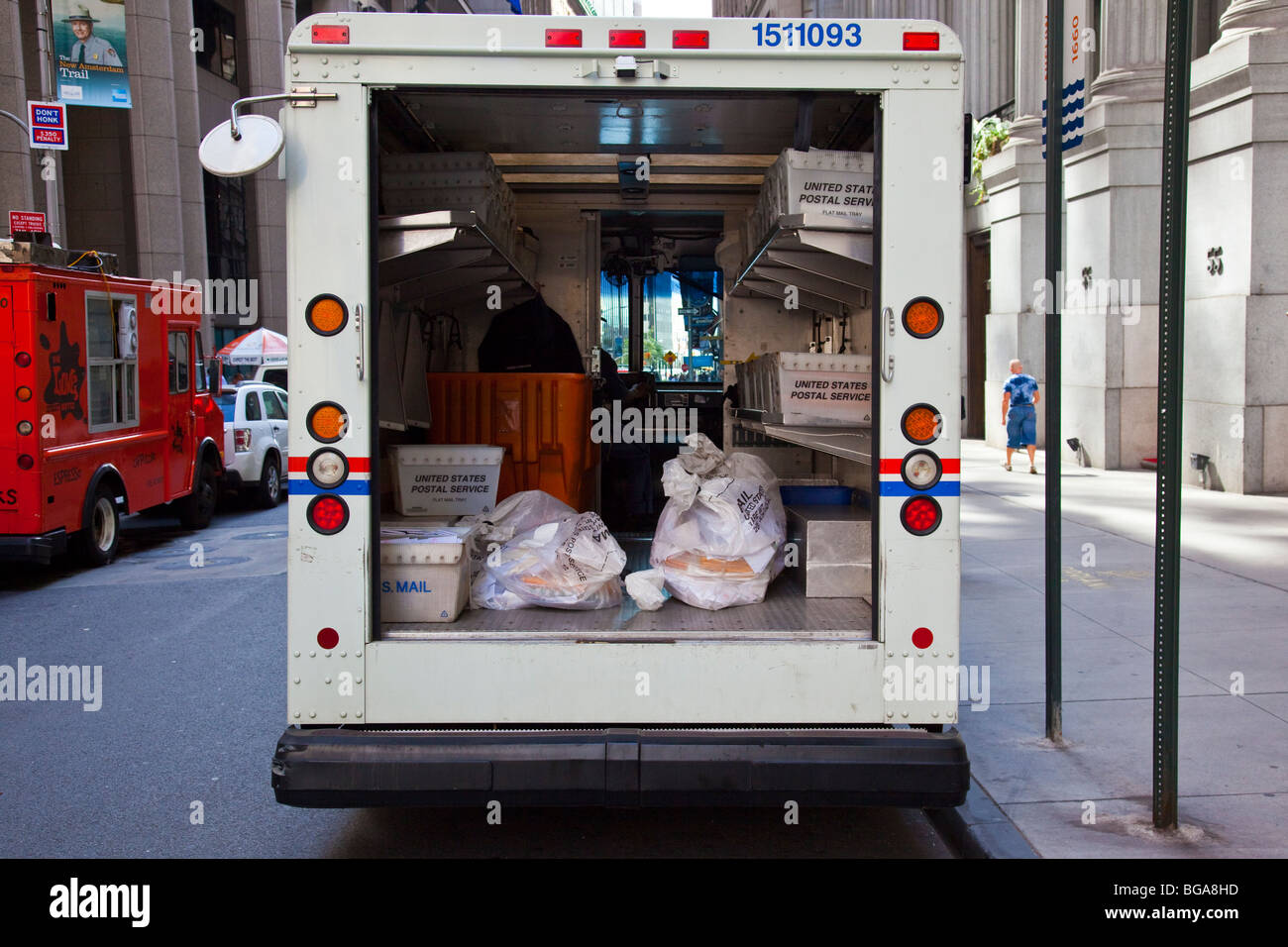 Postal delivery truck in downtown Manhattan, New York City Stock Photo