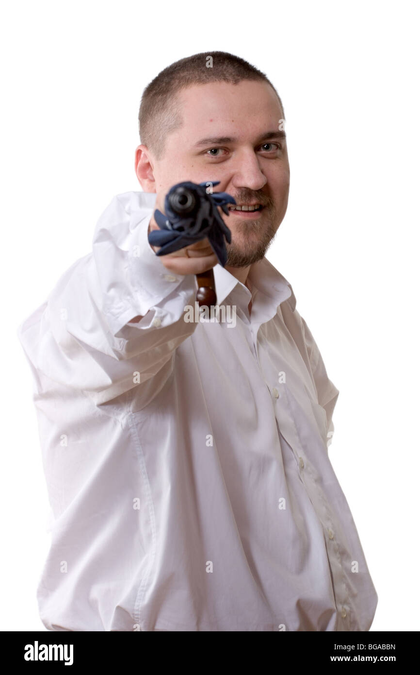 businessman in white shirt holding umbrella like a gun Stock Photo