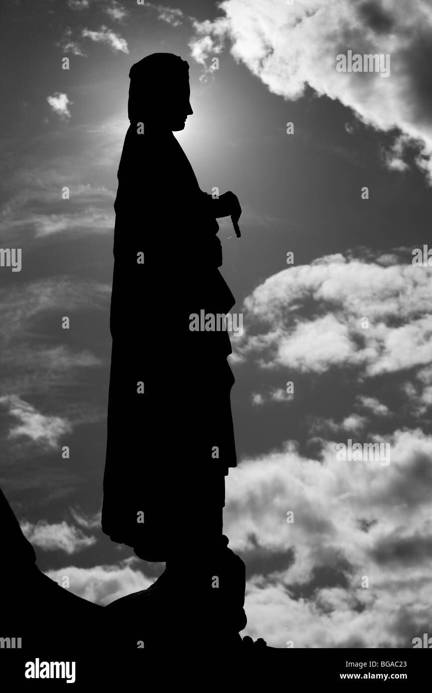 Statue silhouette at Stockholm City Hall tower, Sweden Stock Photo