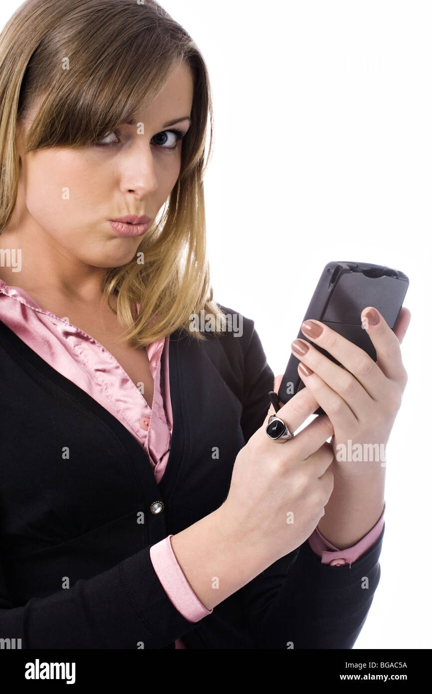 young beautiful woman with a pocket computer in the hand, isolated on white Stock Photo