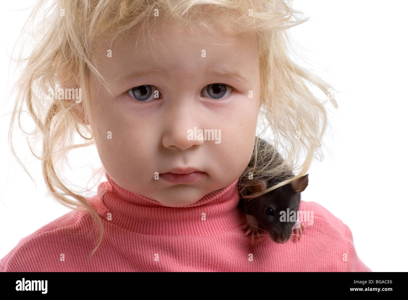 close-up portrait of young girl with rat on white background Stock Photo
