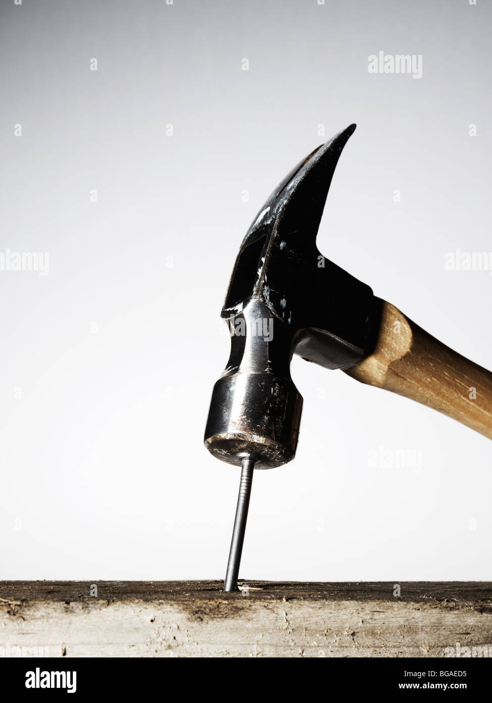 Claw Hammer Hitting Nail Into Wood Stock Photo Alamy