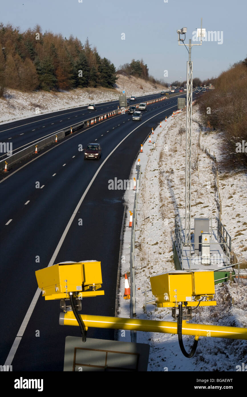 Specs Speed Cameras Fast Traffic M11 Motorway Es England Uk Gb Stock specs-speed-cameras-fast-traffic-m11-motorway-es-england-uk-gb-stock