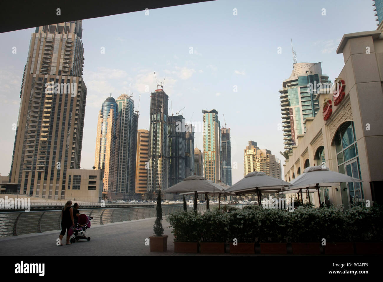 People walking in the newly constructed Marina in central Dubai. Stock Photo