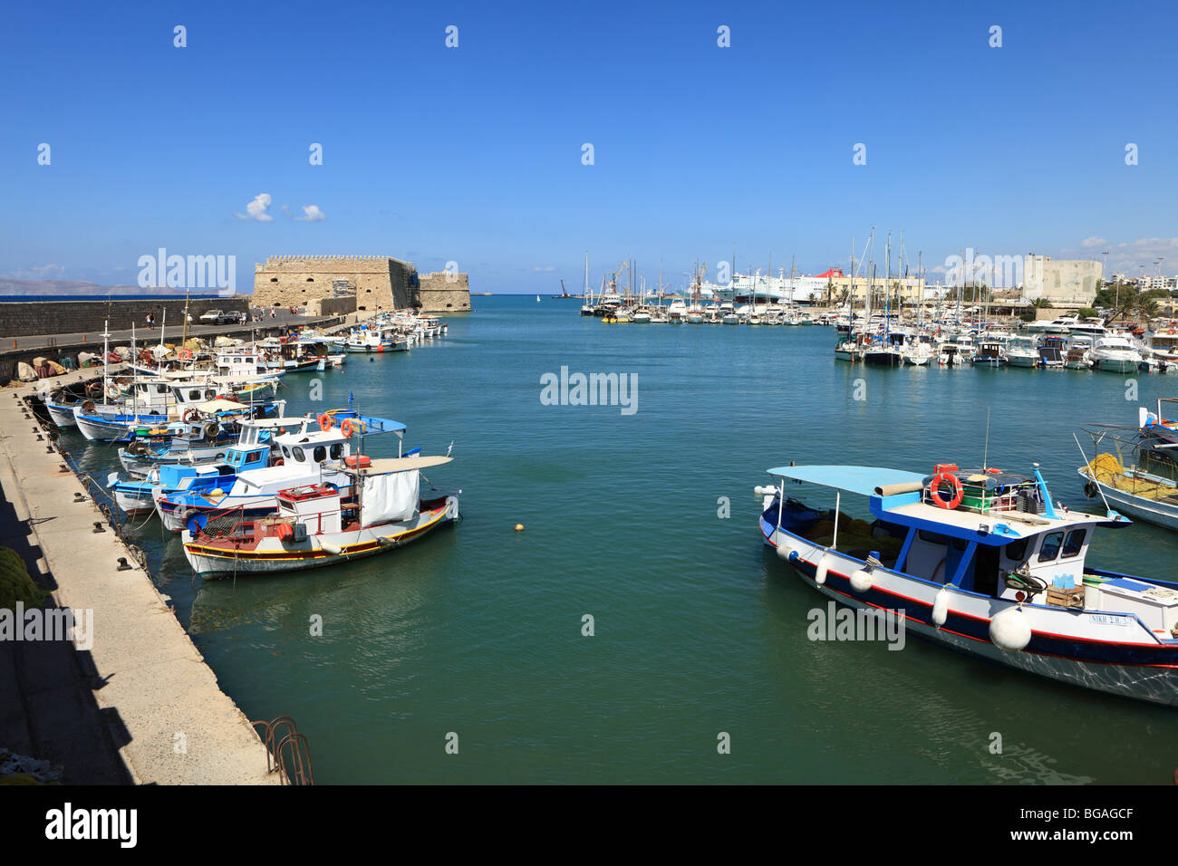 The old fishing harbour and the Koules fort at Heraklion, Crete, Greece Stock Photo