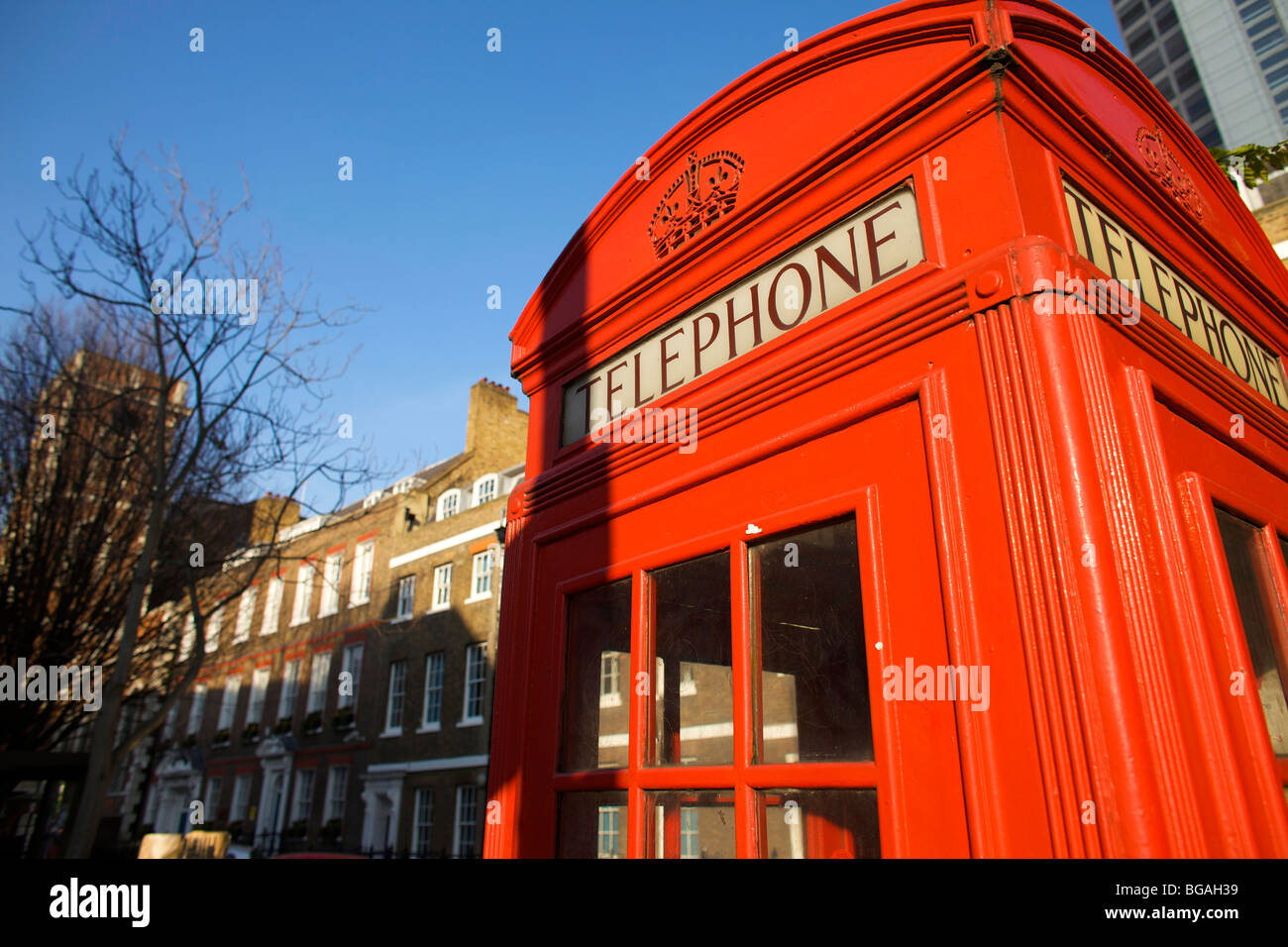 Old fashioned K1 red telephone boxes designed by Sir Gilbert Scott in London UK Stock Photo
