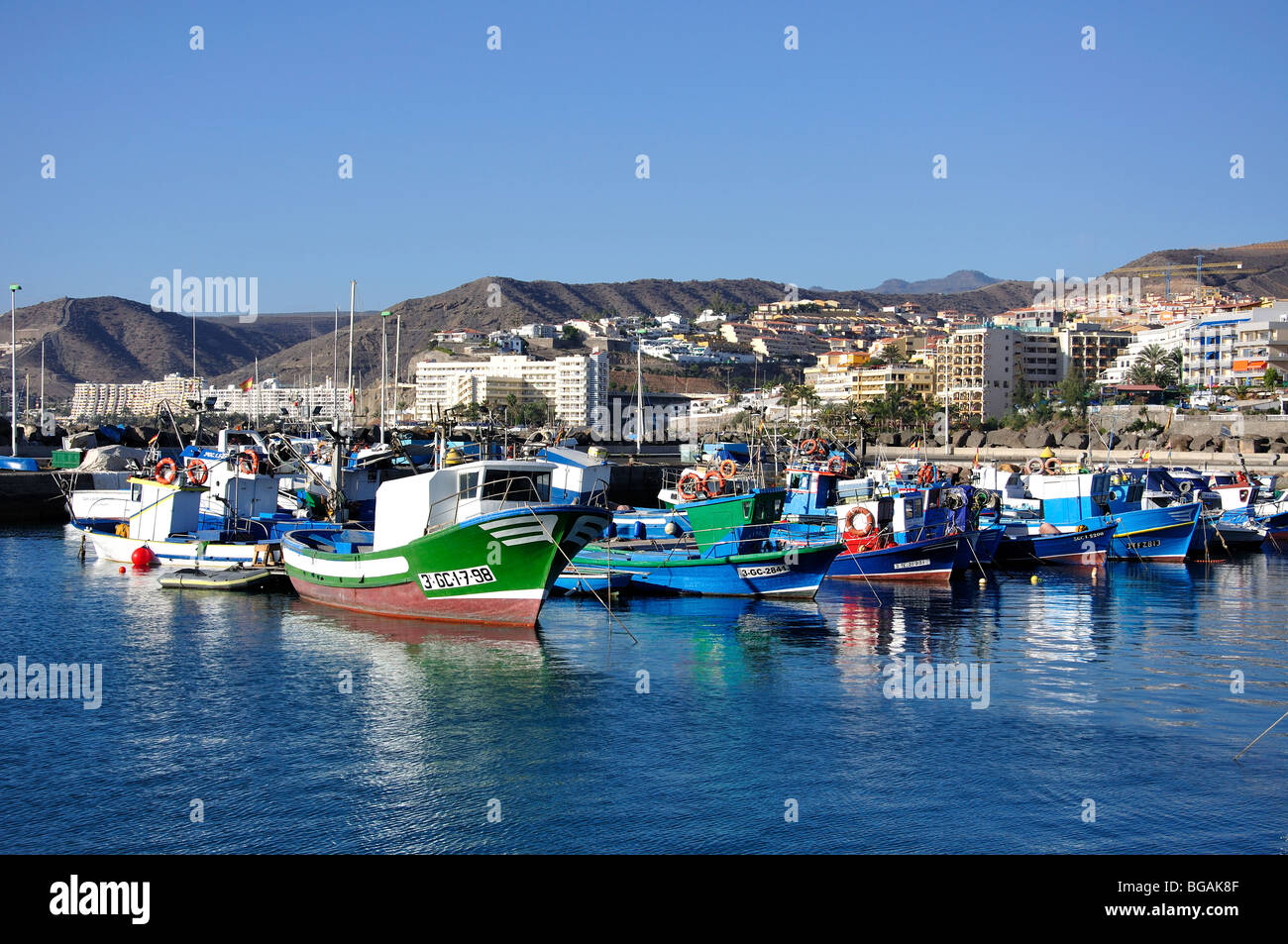 Fishing boats in harbour, Puerto de Arguineguin, Arguineguin, Mogan Municipality, Gran Canaria, Canary Islands, Spain Stock Photo