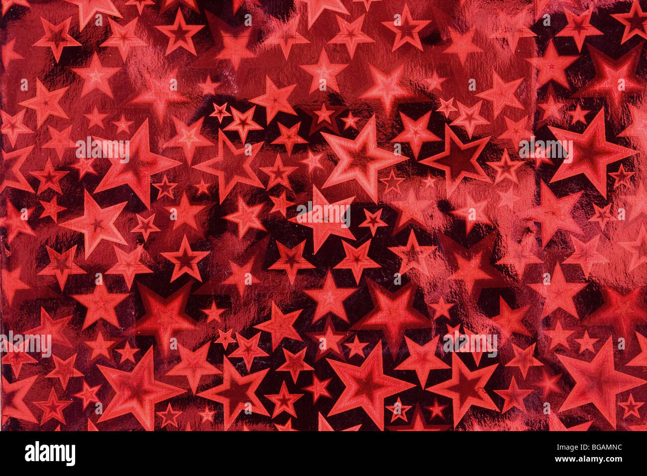 red metallic paper background with star pattern Stock Photo Alamy