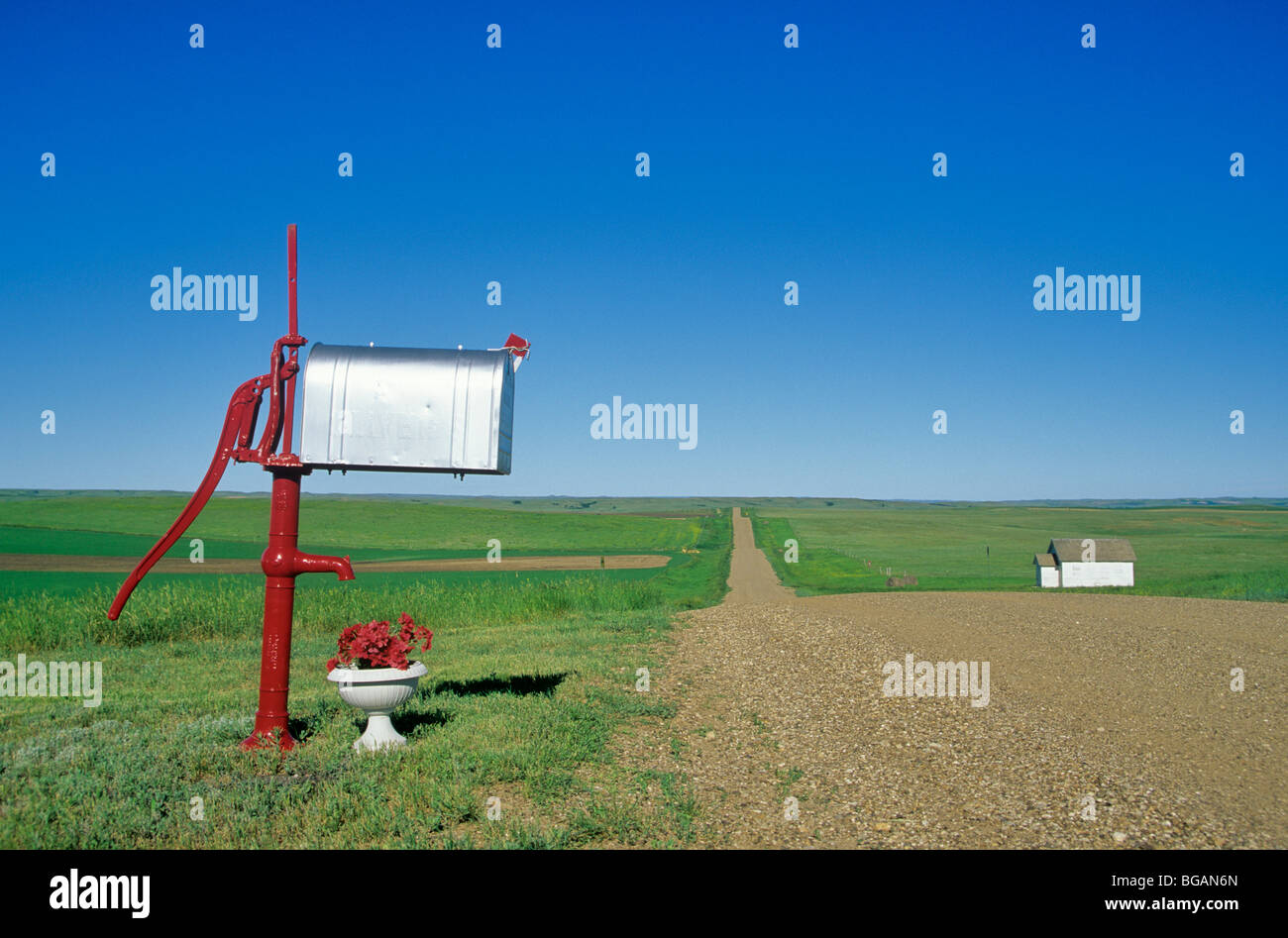 Ranch mailbox and along country road with old country school house on Great Plains near Bison, South Dakota, Bean_ALPix_0508 Stock Photo