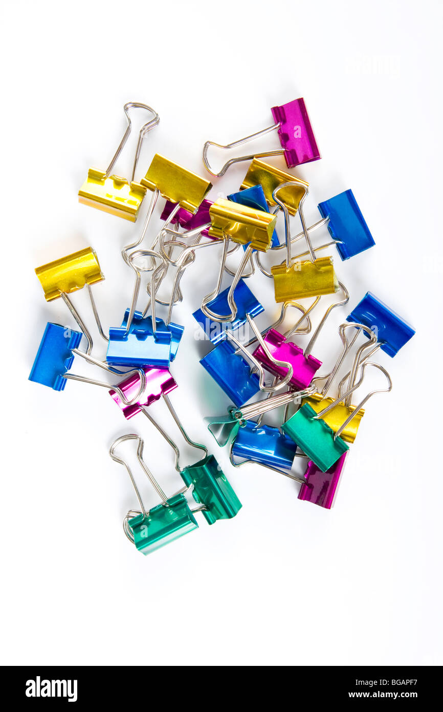 Pile of colorful paperclips isolated on white, perfect for use in