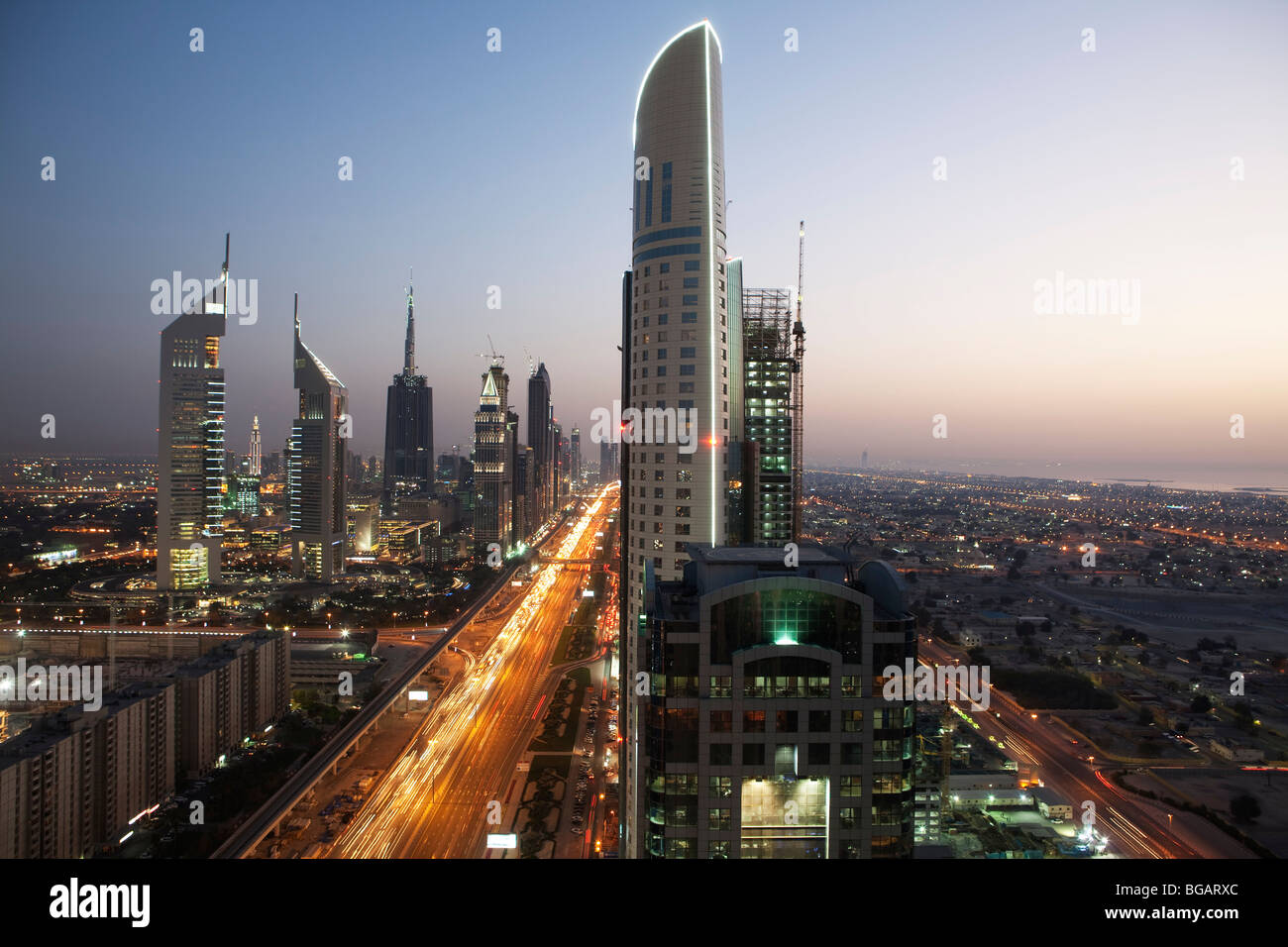 Sheikh Zayed Road at dusk, Dubai, United Arabian Emirates Stock Photo