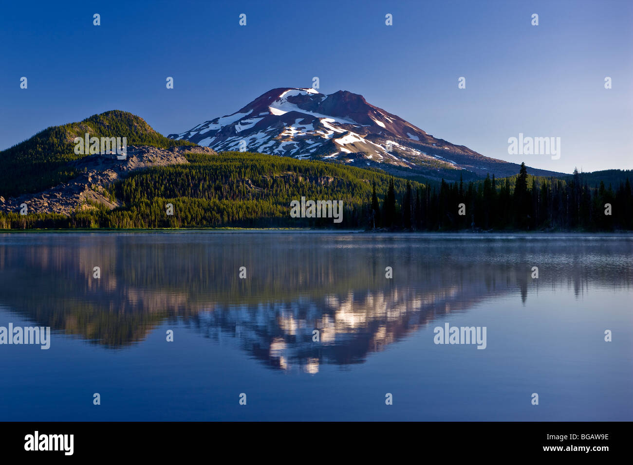 SPARKS LAKE, OREGON, USA - South Sister mountain, Cascades range, reflected in Sparks Lake  early morning. Stock Photo