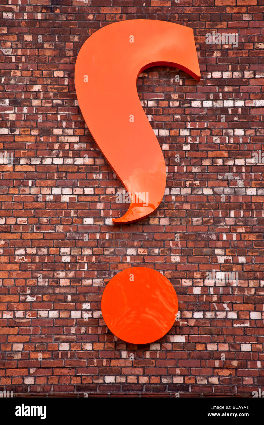 Reversed question mark Logo on wall in Ancoats, Manchester Stock Photo