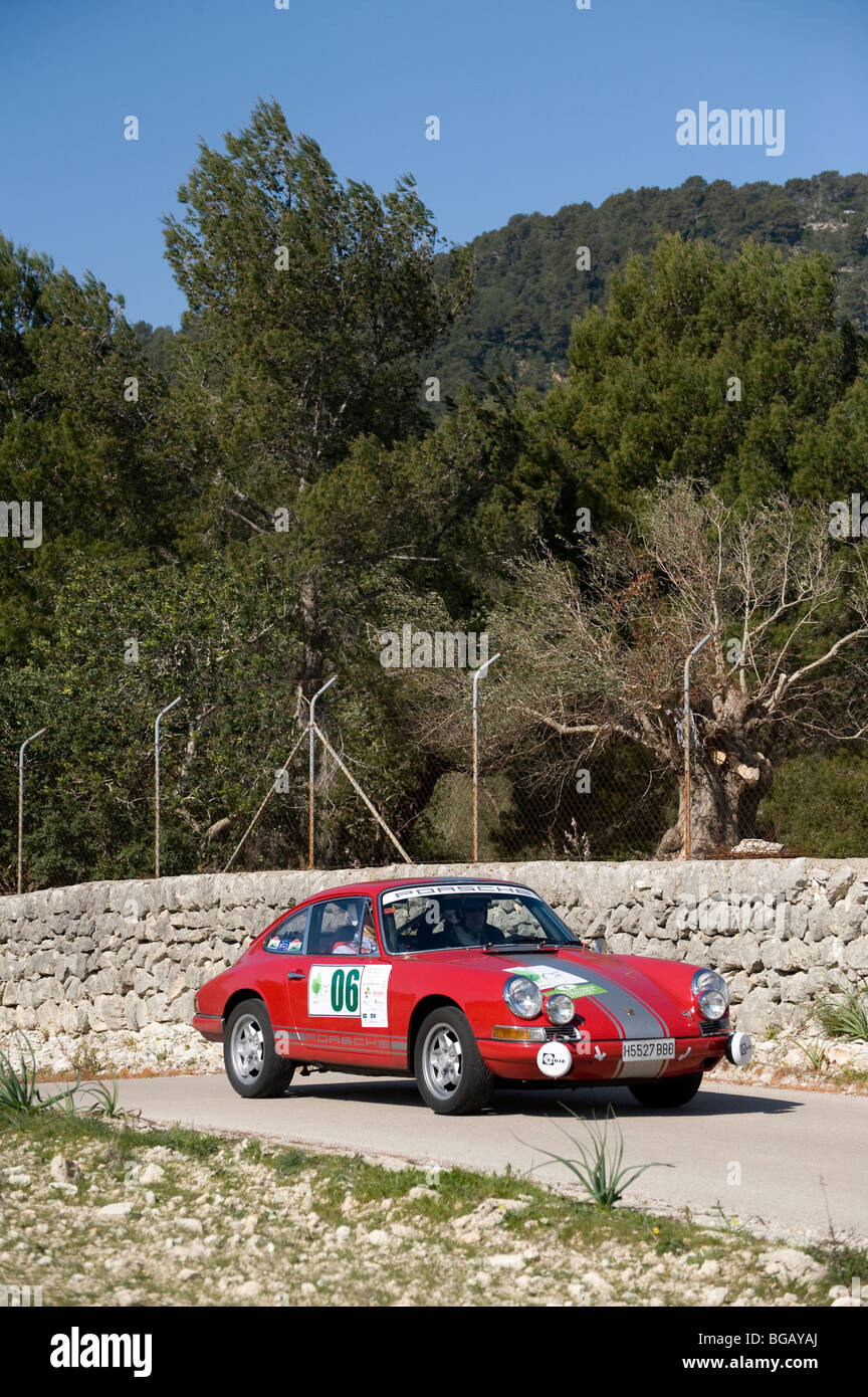 Red 1968 Porsche 911s classic sports car racing in a rally in Spain Stock Photo