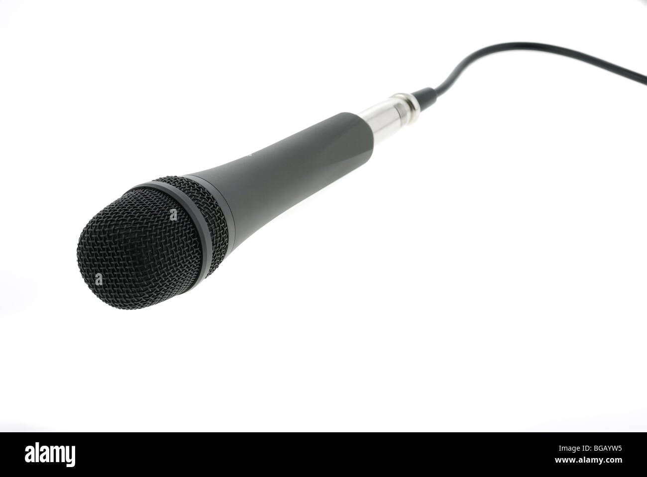 Isolated microphone with cable. The studio musical microphone isolated