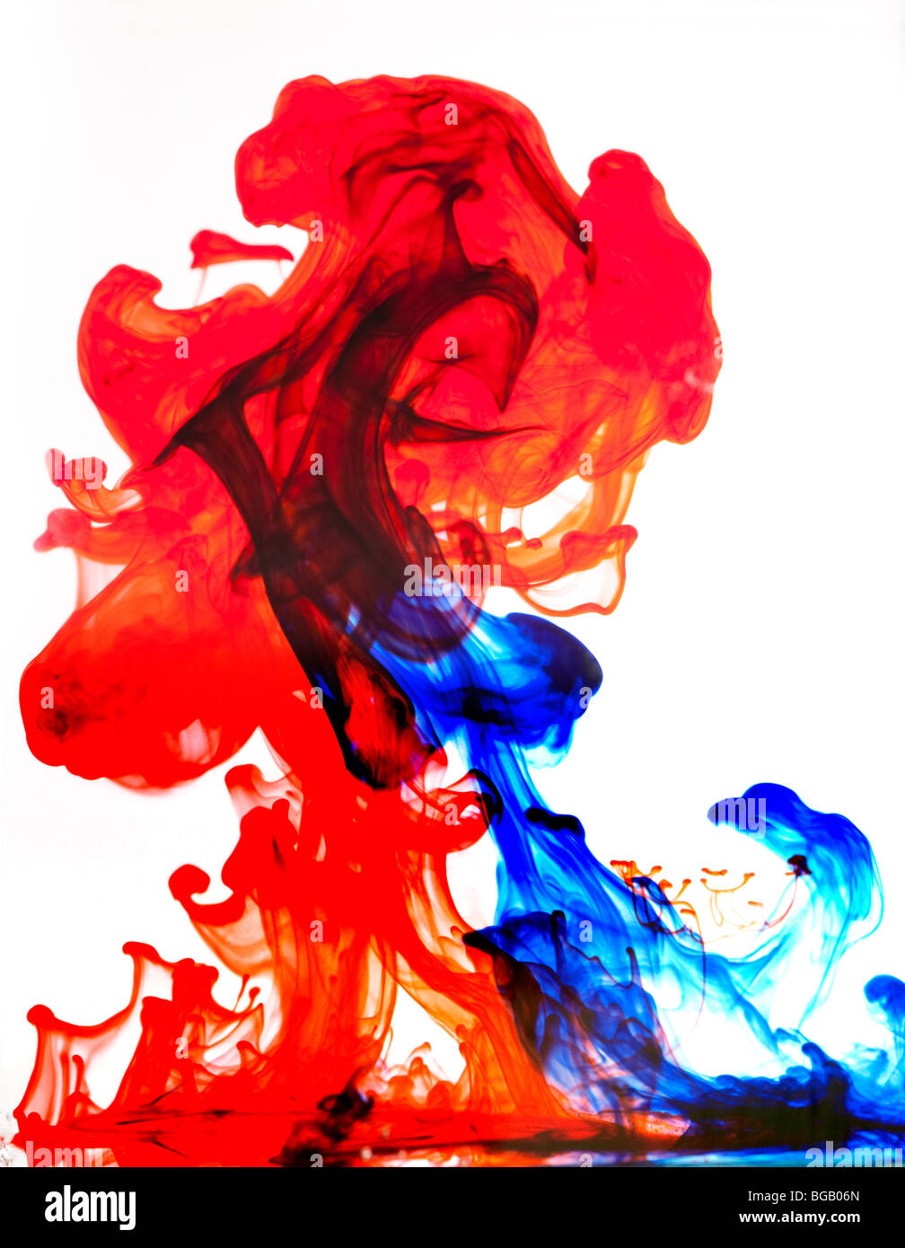 Dye swirls in water Stock Photo