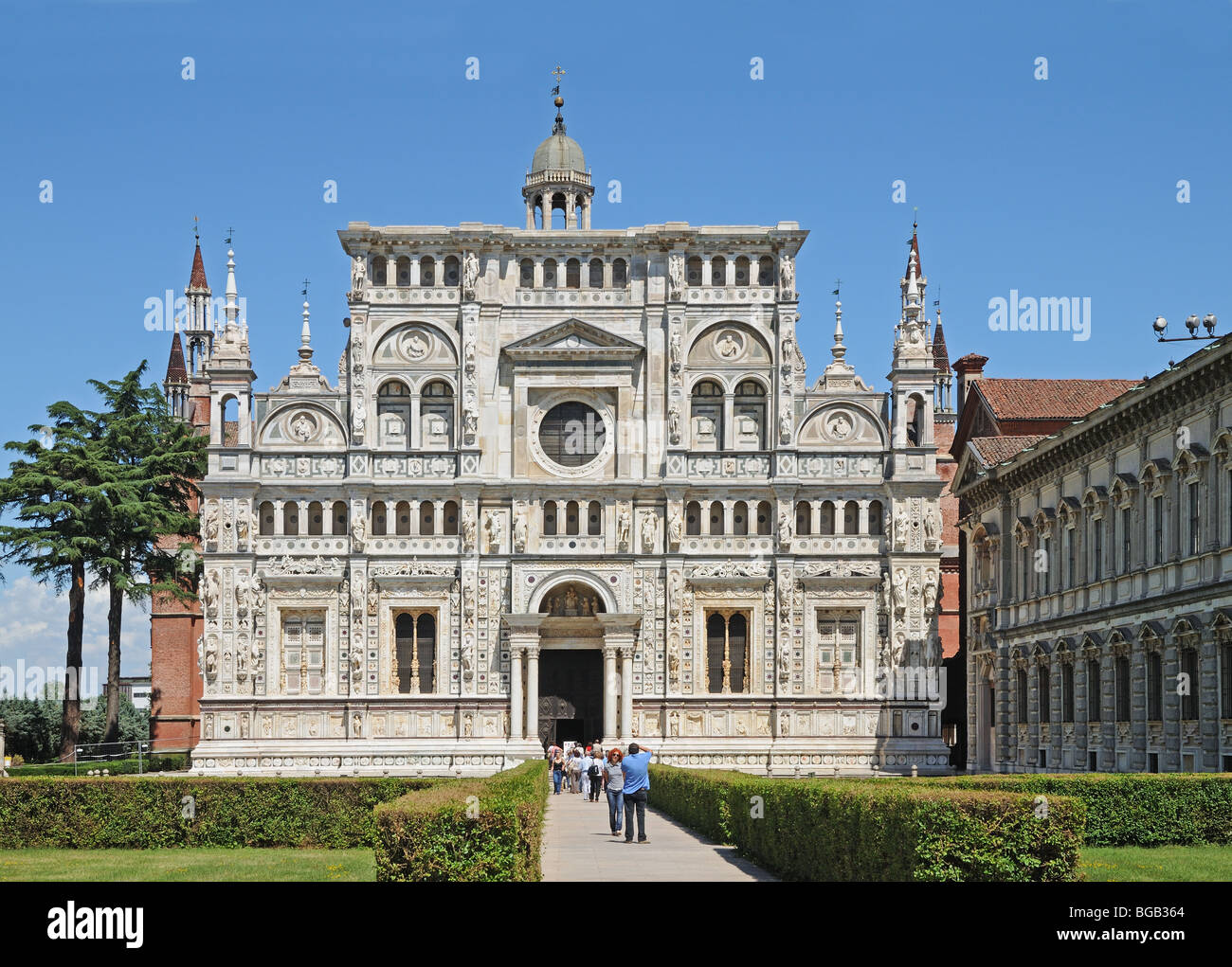 Certosa di Pavia Carthusian Monastery Lombardy Italy with Palace of Dukes of Milan on right Stock Photo