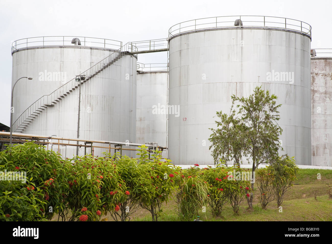 Storage container for palm oil crude. The Sindora Palm Oil Mill, Malaysia. Stock Photo