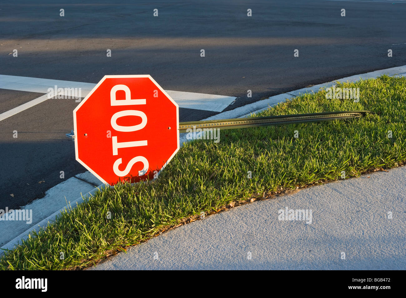 Fallen stop sign in the street due to hurricane Wilma, Florida, USA Stock Photo