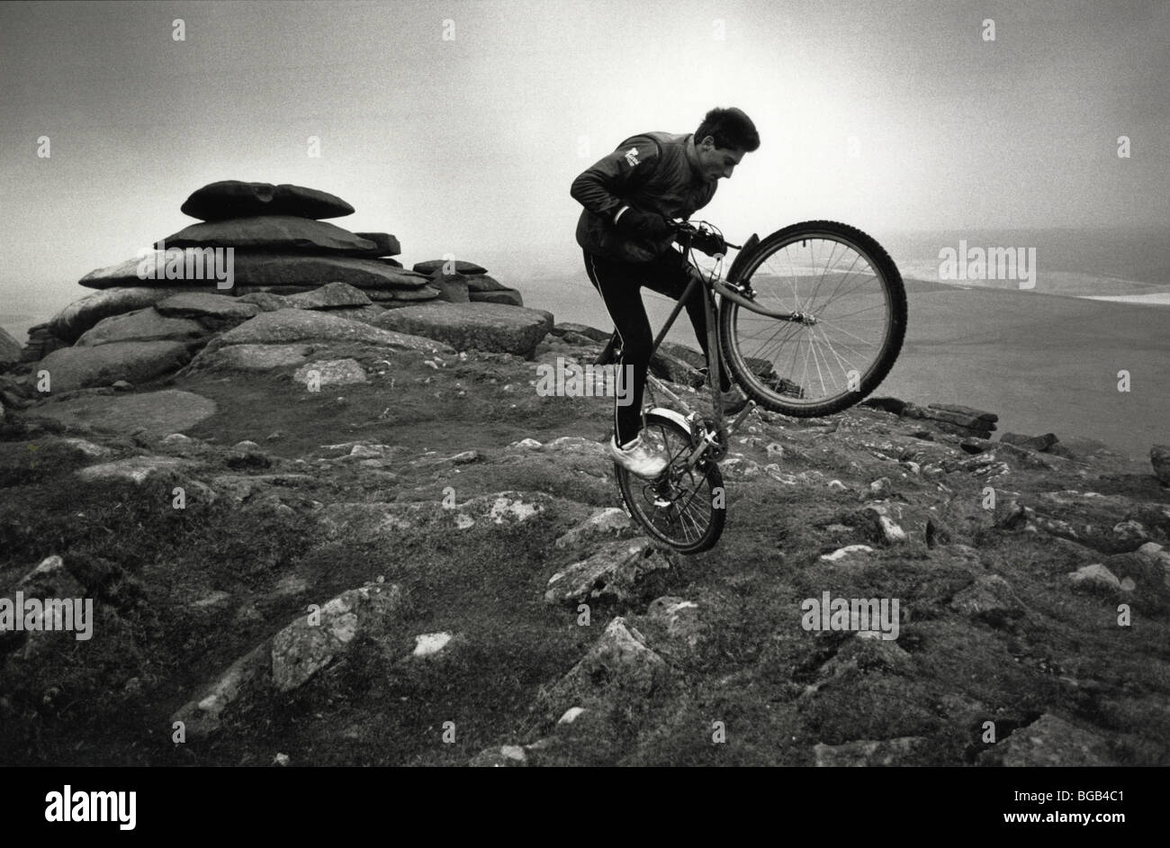 A Junior Mountain Bike champion on Rough Tor, Bodmin Moor, a Cornish landmark Stock Photo