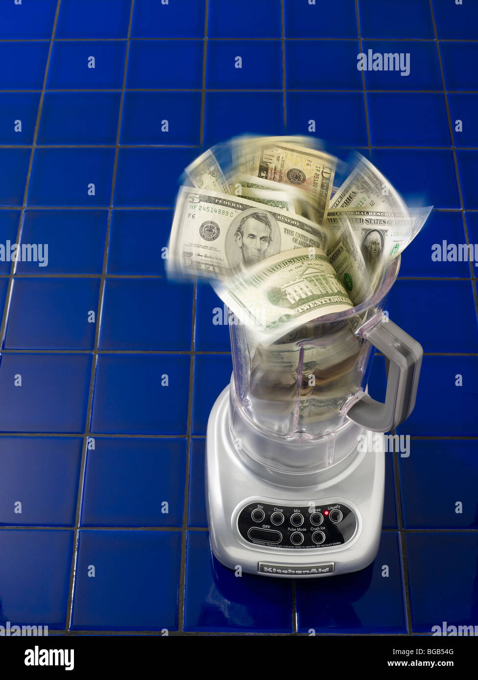 Blender with US currency turning inside Stock Photo