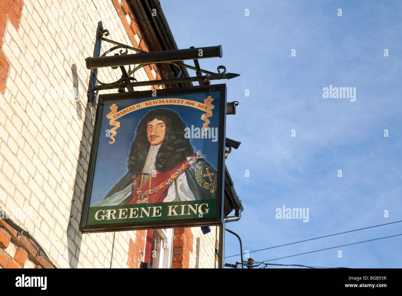 Greene King sign at the Kings Head pub, Moulton Village, Newmarket Suffolk Stock Photo