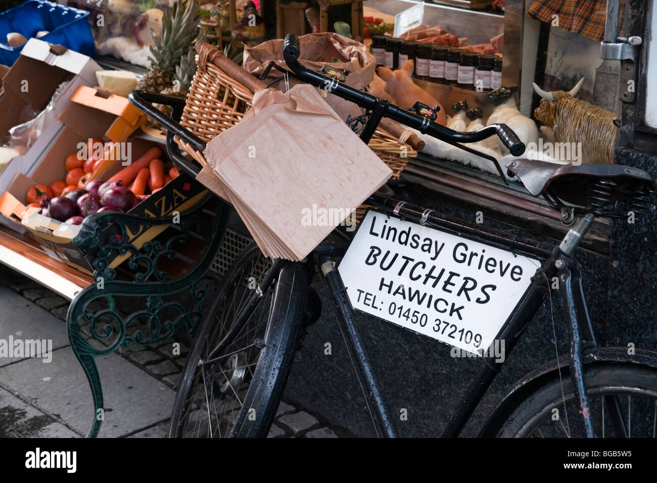 Traditional delivery bicycle for butchers and grocers shop Lindsay Grieve of Hawick in Scotland Stock Photo