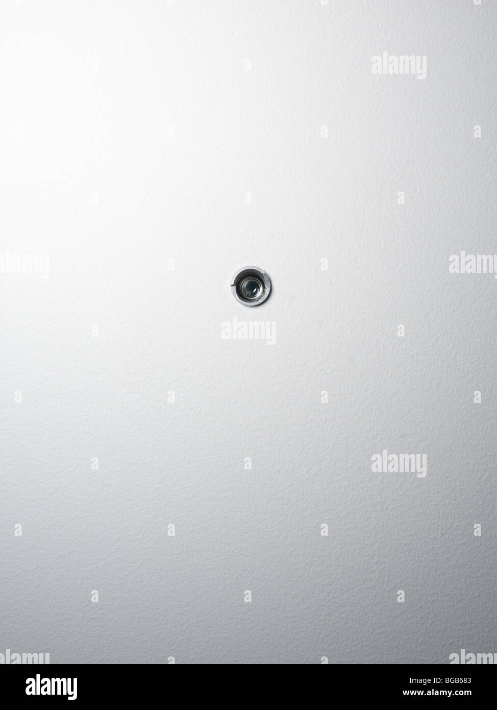 spy hole in a door Stock Photo