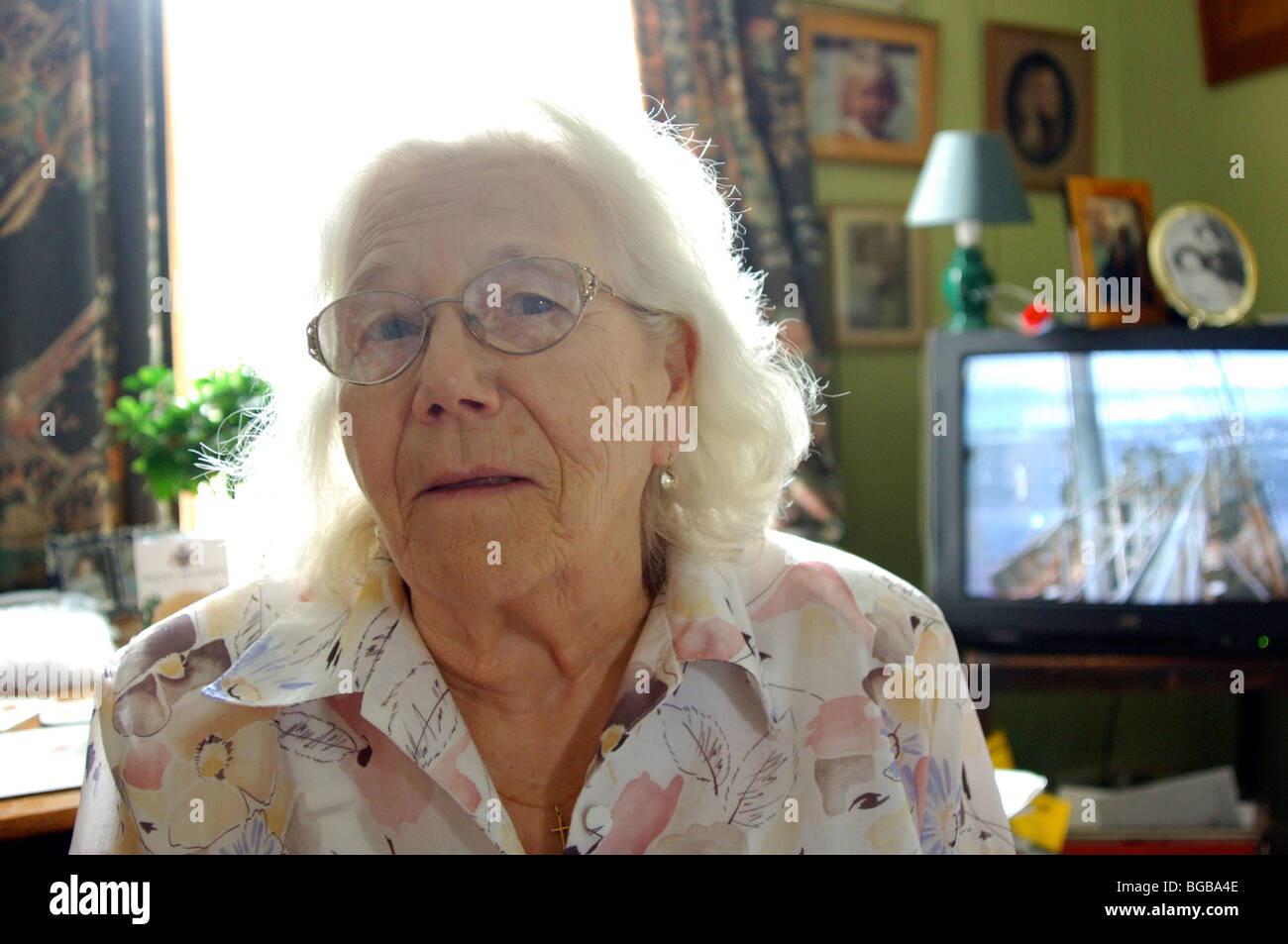 Royalty free photograph of old woman in her home in London UK Stock Photo