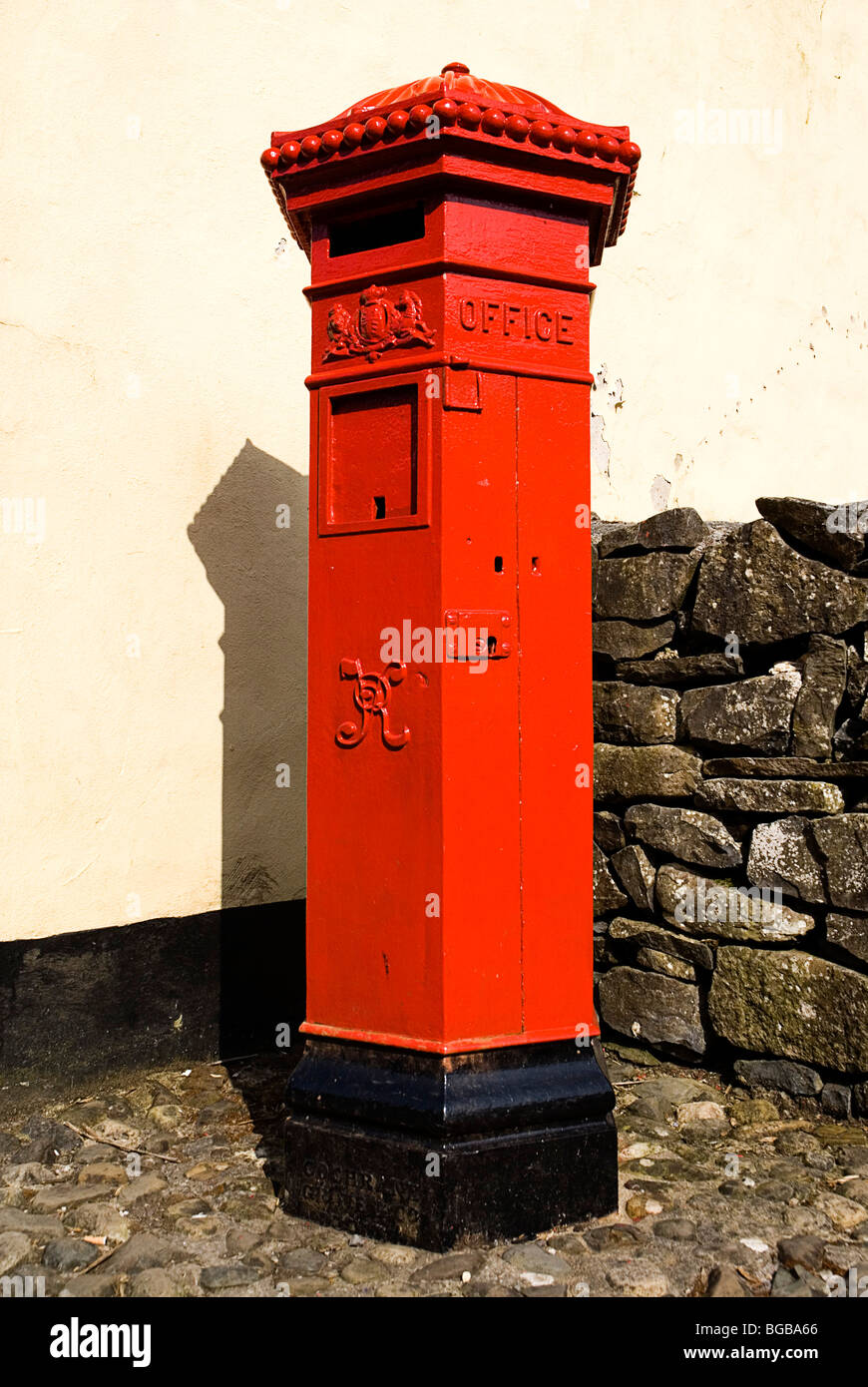 Ireland, County Clare, Bunratty Folk Park, The Village Street denoting life in 19th Century Ireland with red post box. Stock Photo