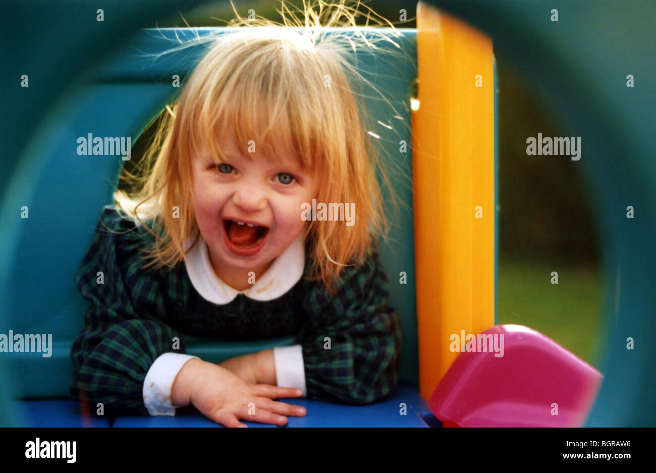 Photograph of happy girl playing nursery play time healthy smile Stock Photo