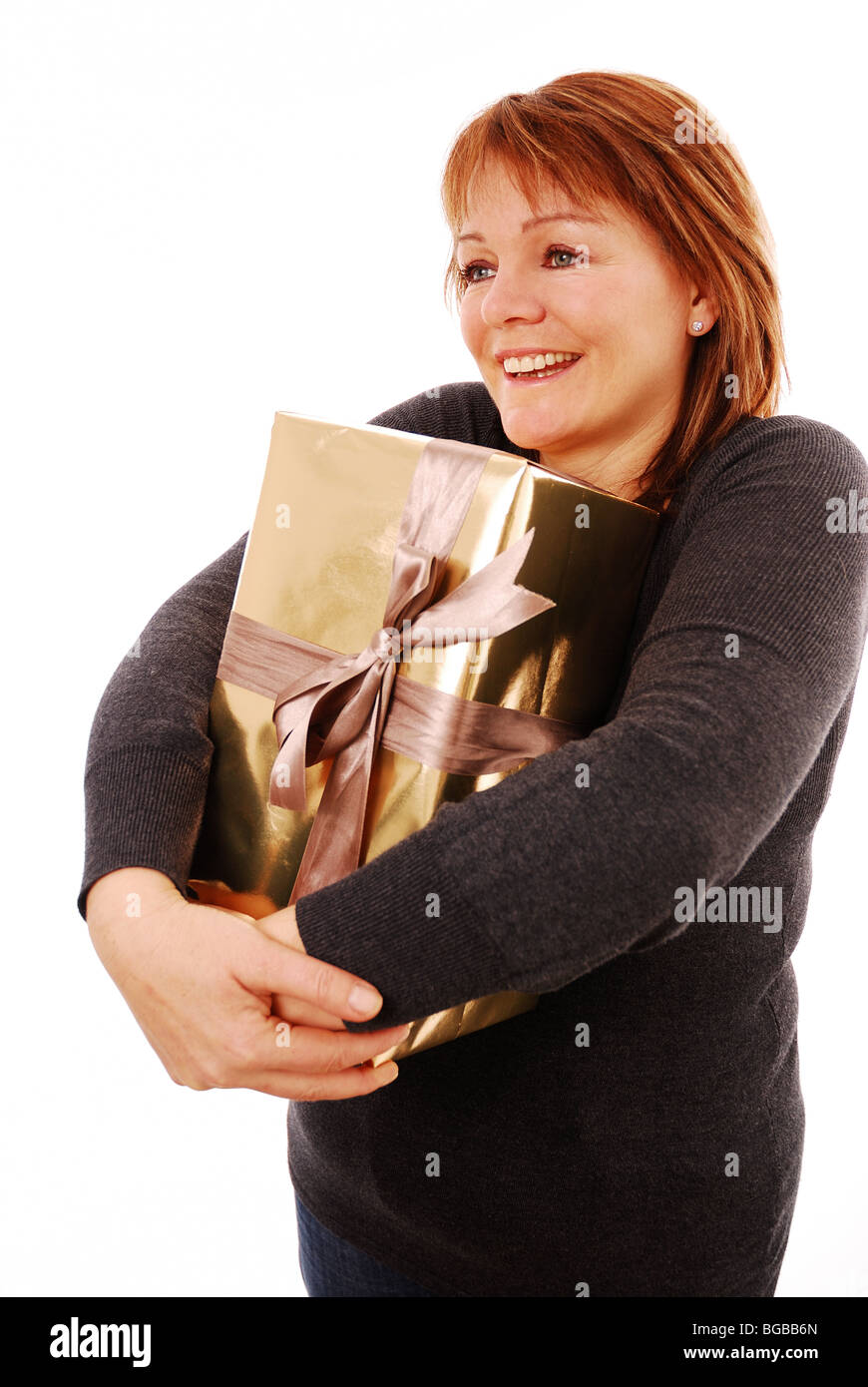 Mature woman wrapping christmas hi-res stock photography and images - Alamy