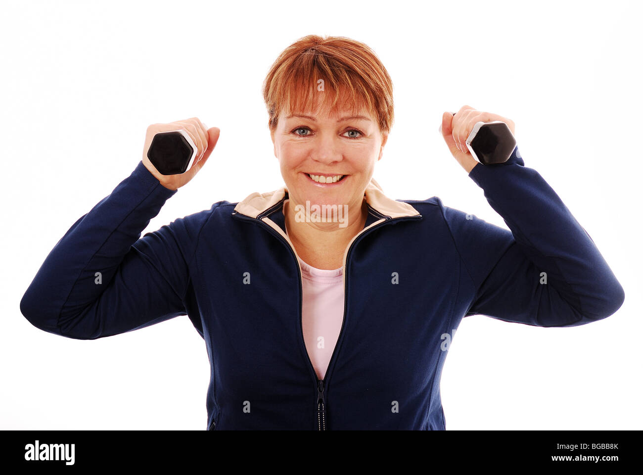 Woman working out with dumb bells Stock Photo