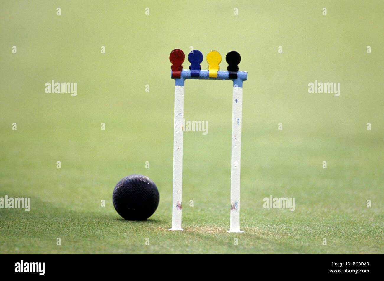 Croquet ball and hoop with markers Stock Photo Alamy