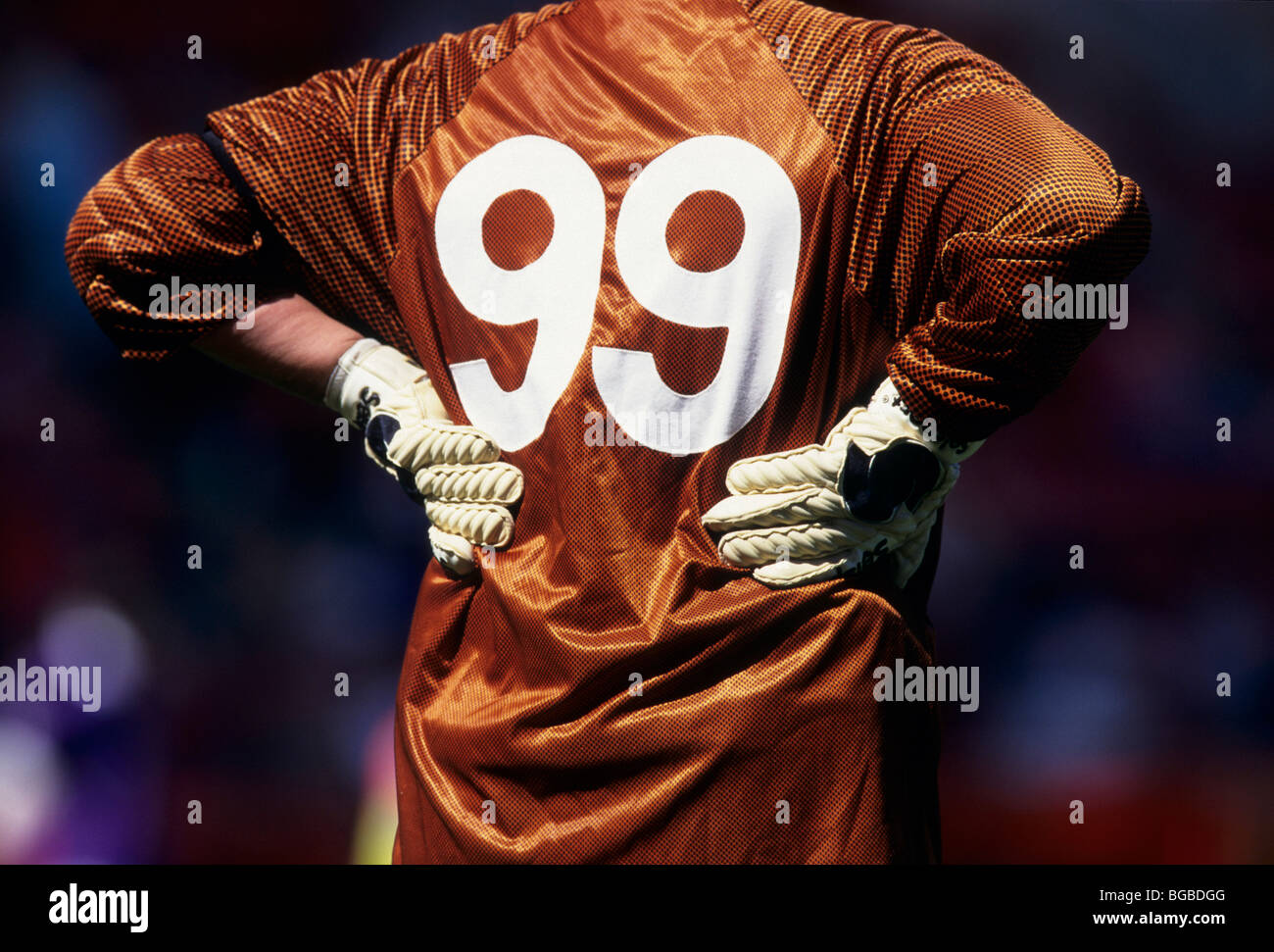 Goalkeeper standing with hands on hips Stock Photo Alamy