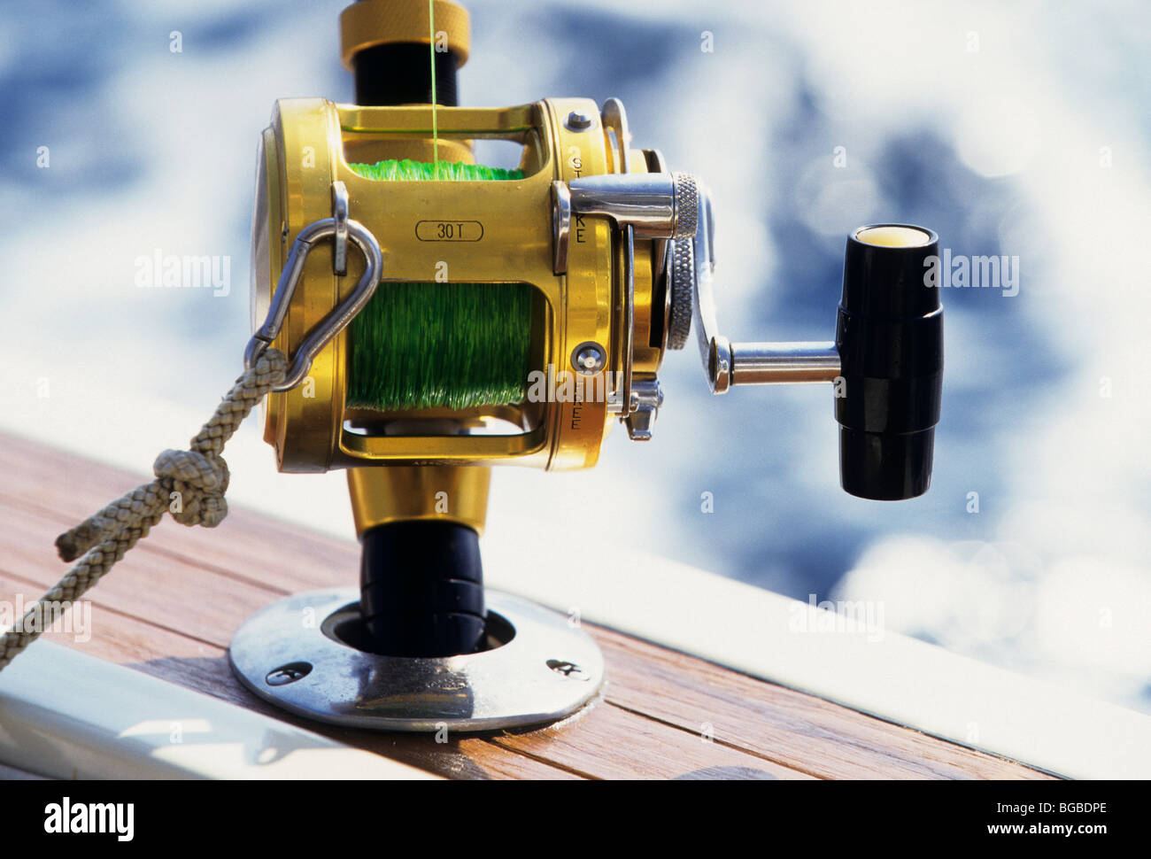 Close up of a deep sea fishing reel Stock Photo - Alamy