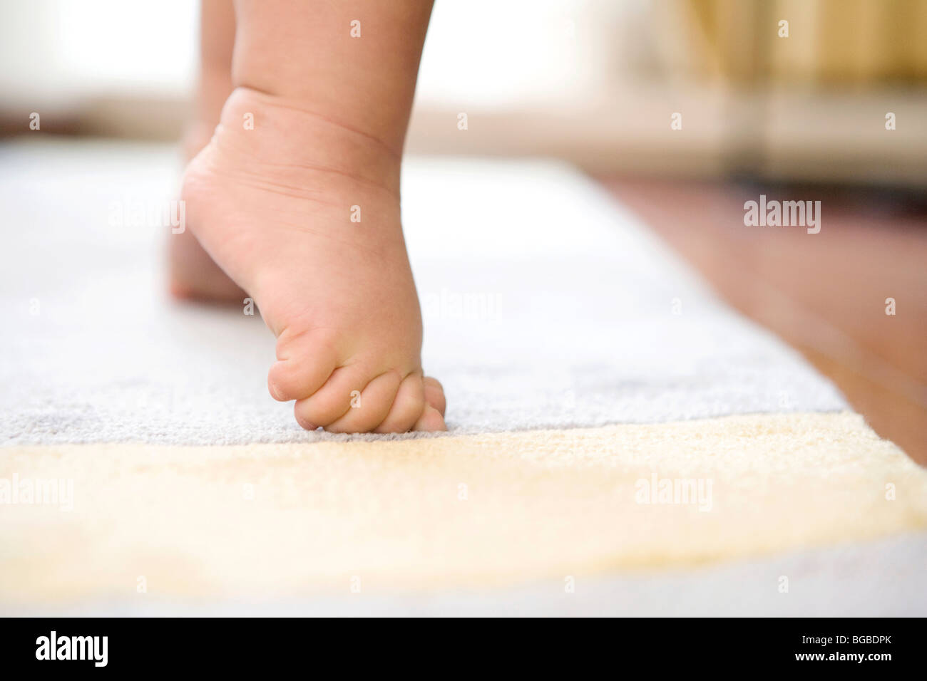 Infant feet Stock Photo - Alamy
