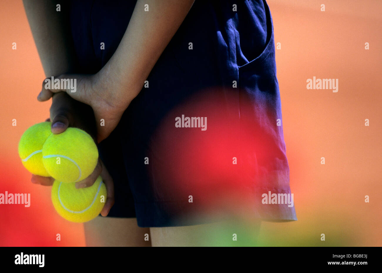 Close Up Of A Ball Boy Holding Tennis Balls Stock Photo Alamy