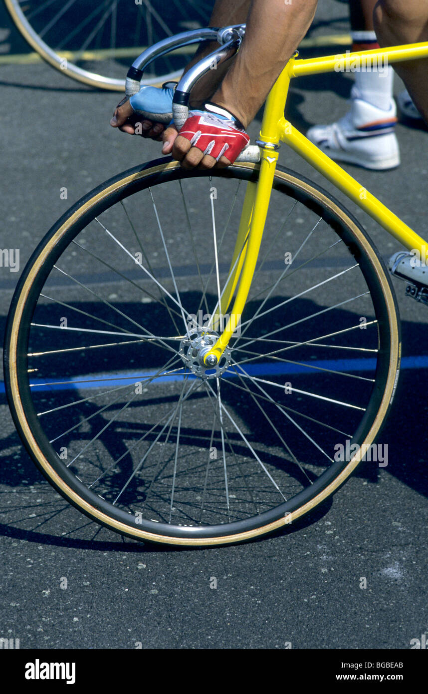 Cyclist holding bike handle bars Stock Photo