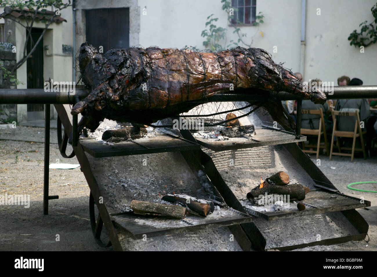 A pig roast at the medieval fair of Besalu, Catalonia, Spain Stock Photo