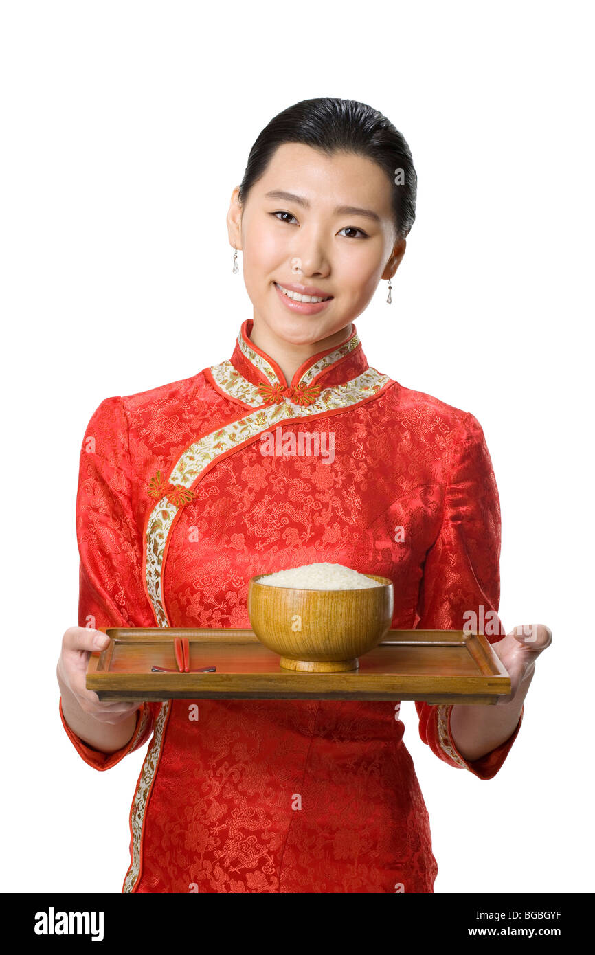 Server Carrying Rice Stock Photo