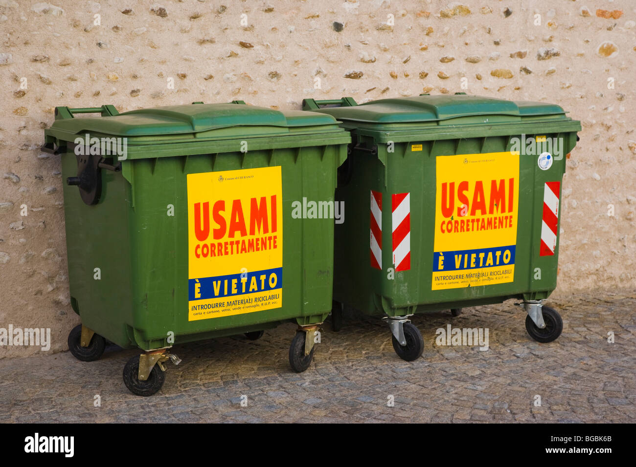 Recycling trash bins on the street, Cherasco, Piedmont, Italy Stock