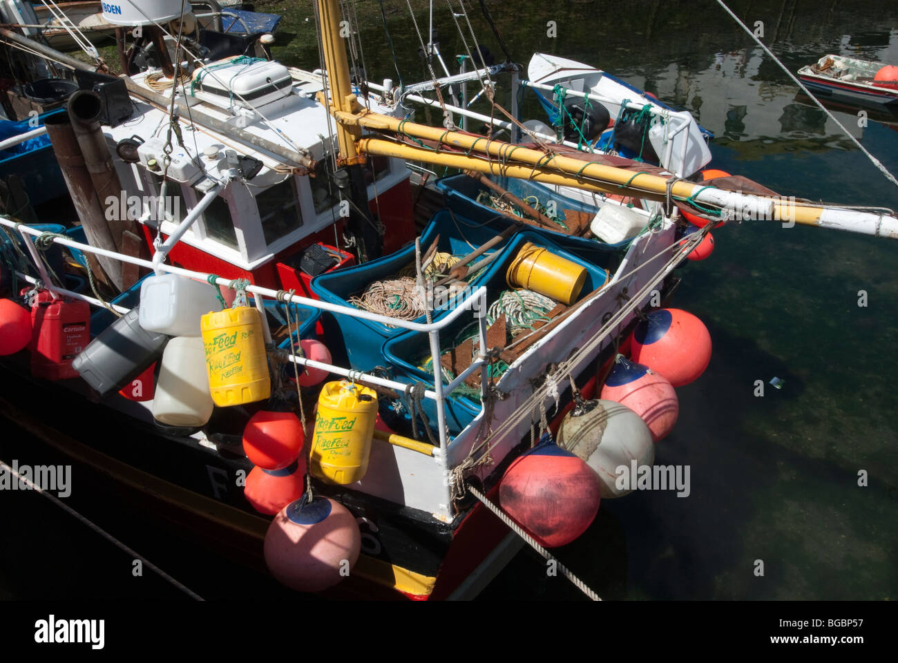 Fishing boat with buoys in Cornwall UK Stock Photo Alamy