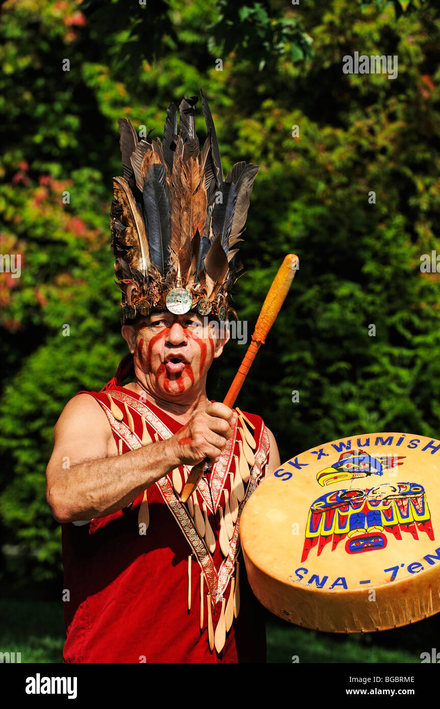 Squamish Indian, Native American, with drum, Stanley Park, Vancouver, British Columbia, Canada Stock Photo