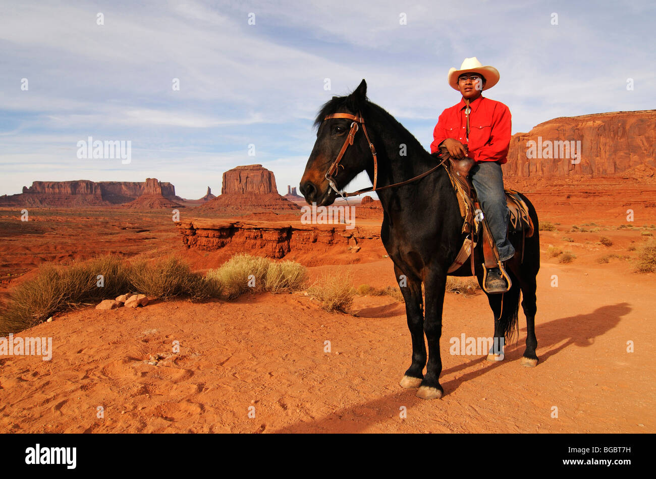 Navajo, Native American on horseback, Monument Valley, Navajo Tribal Lands, Utah Stock Photo
